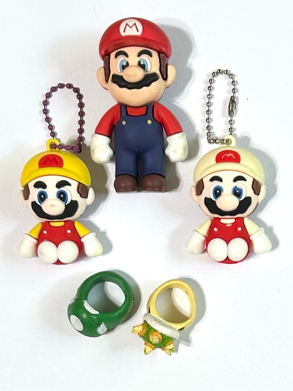 4/$20 Super Mario Figure, Keychains and 2 Rings.